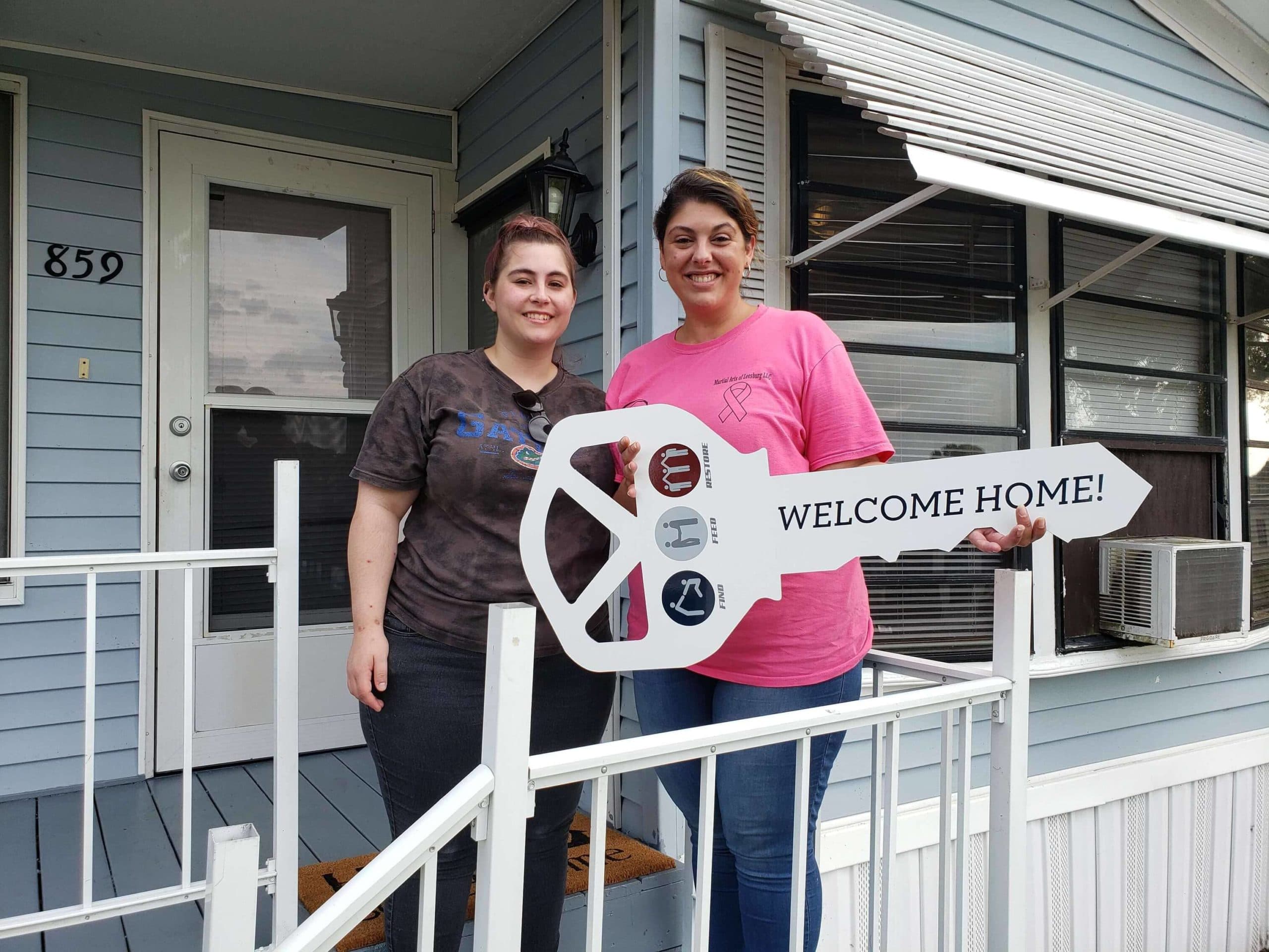 Family celebrating housing support