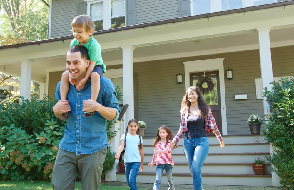 Family outside their home
